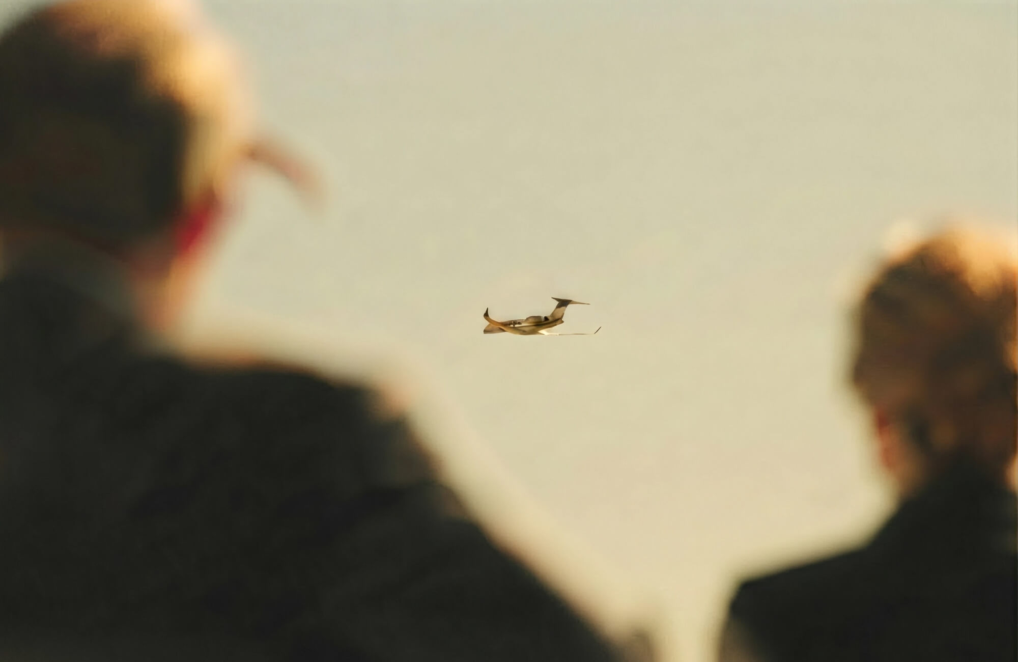 Two businesspeople are checking their private jet they intend to buy or sell